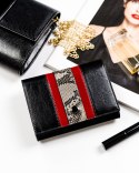 Elegancki portfel damski ze wzorem wężowej skóry RFID - Peterson Elegancki portfel damski ze wzorem wężowej skóry RFID - Peterson