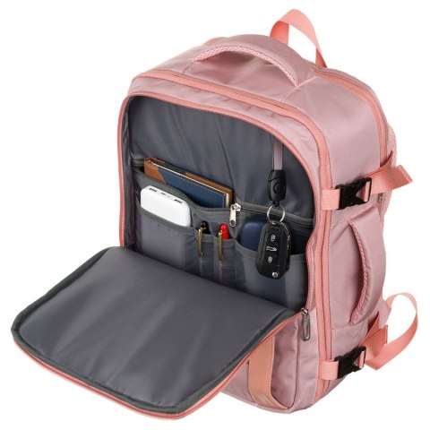 Plecak z miejscem na laptopa wykonany z cordury w różowym kolorze, zawieszony na regulowanych szelkach - Peterson