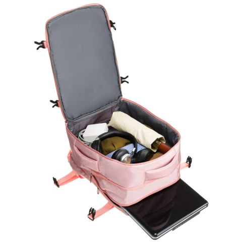 Plecak z miejscem na laptopa wykonany z cordury w różowym kolorze, zawieszony na regulowanych szelkach - Peterson